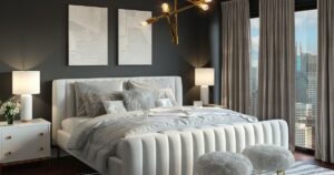bedroom with dark accent wall white upholstered bed and nightstand