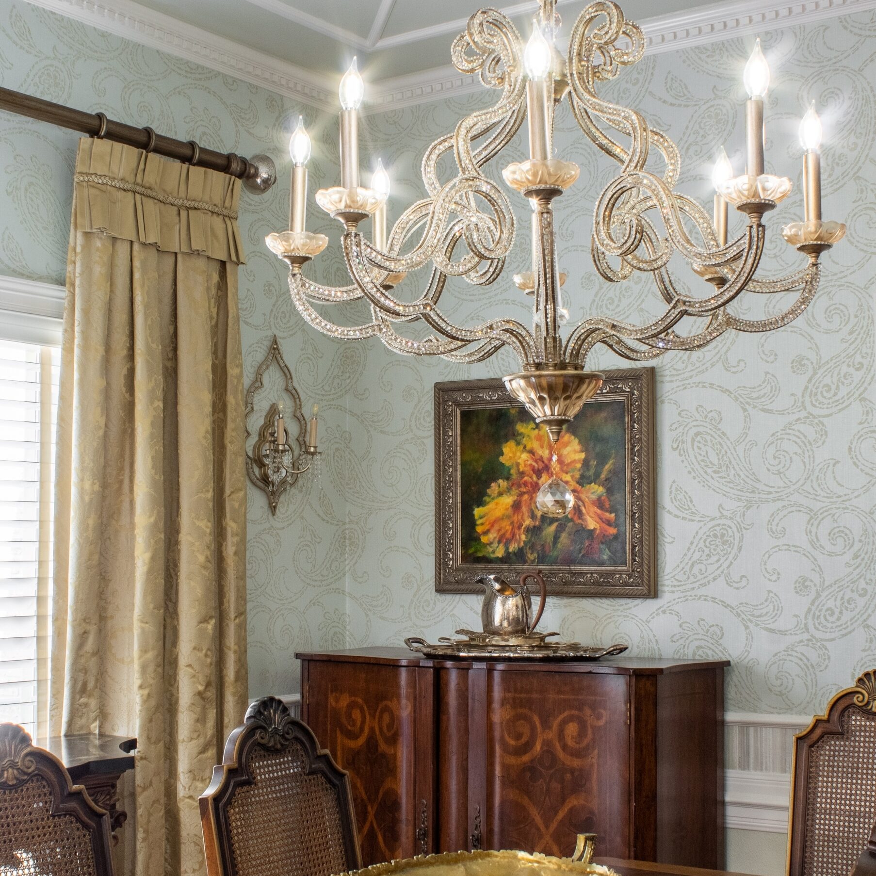 dining room with fixture drapery and window